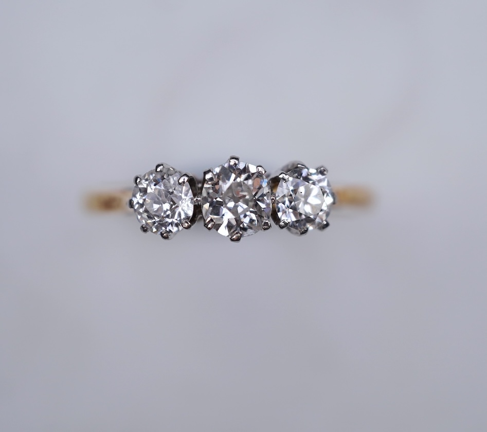 A three-stone diamond ring, early 20th century